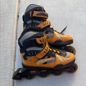 Orange and Black Rollerblades